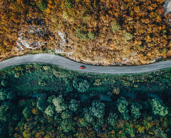 Aerial view of a car on a road