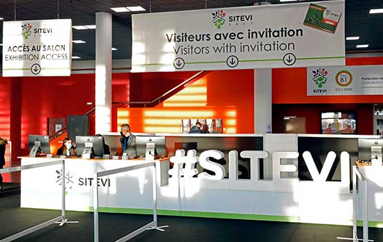 Hashtag SITEVI in front of the reception desk